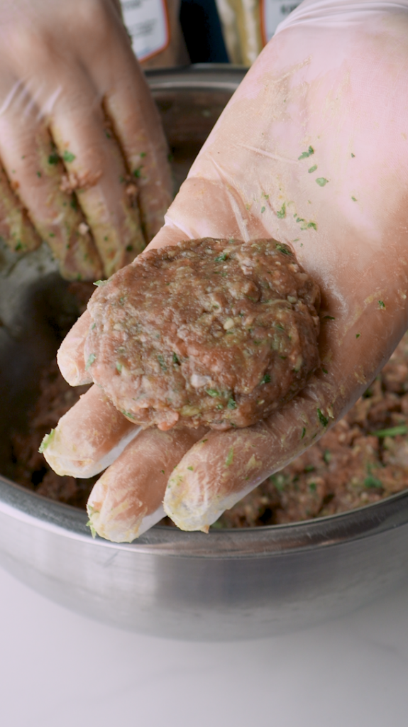 Then shape the mixture into small balls and gently pressing them into patties, and set them aside. 